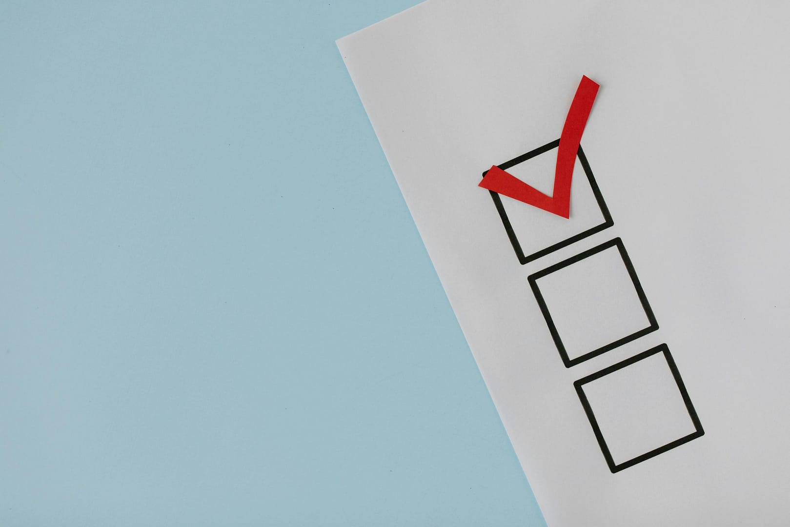 Checklist illustration with red checkmark