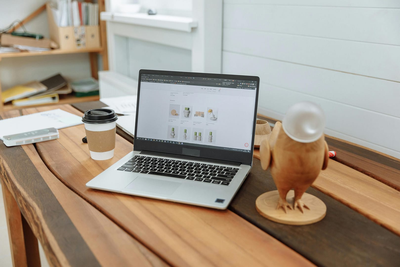 Computer open to a very neatly done branding e-commerce site